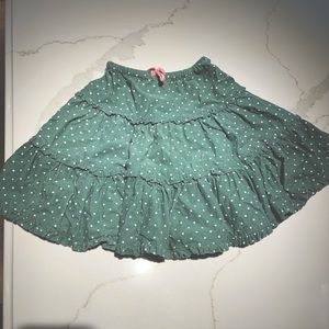 Mini Biden girls skirt green with white polka dots